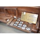 Hymn board plus a brass remembrance plaque