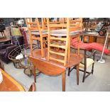 Teak dropside table plus four leather back chairs. Collectors item see soft furnishings policy