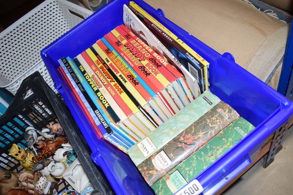 A box of annuals and books