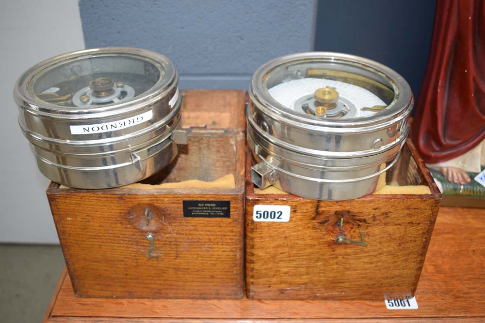 Two oak cased pigeon clocks