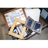A box of photo and picture frames