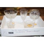 2 boxes containing crystal glasses