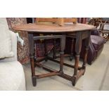 Oval oak dropside table plus a circular side table with stretchers