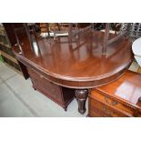 Victorian wind out dining table with two extra leaves