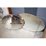 Two oval bevelled 1950's mirrors