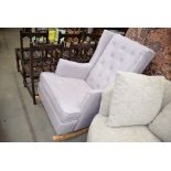 Grey fabric rocking chair