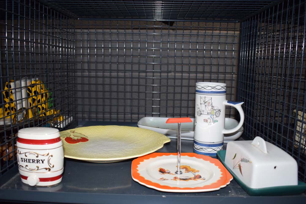 5639 - Cage containing a Denby butter dish, Wade ornamental sherry barrel plus general crockery