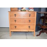 Waring and Gillows oak chest of three drawers