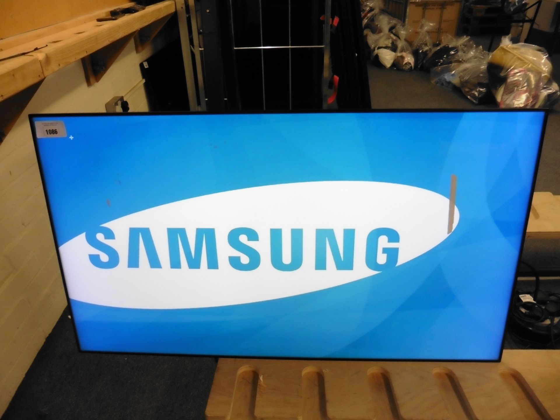 Samsung model UE46D colour display screen with remote and tape on screen (manufactured 2014)