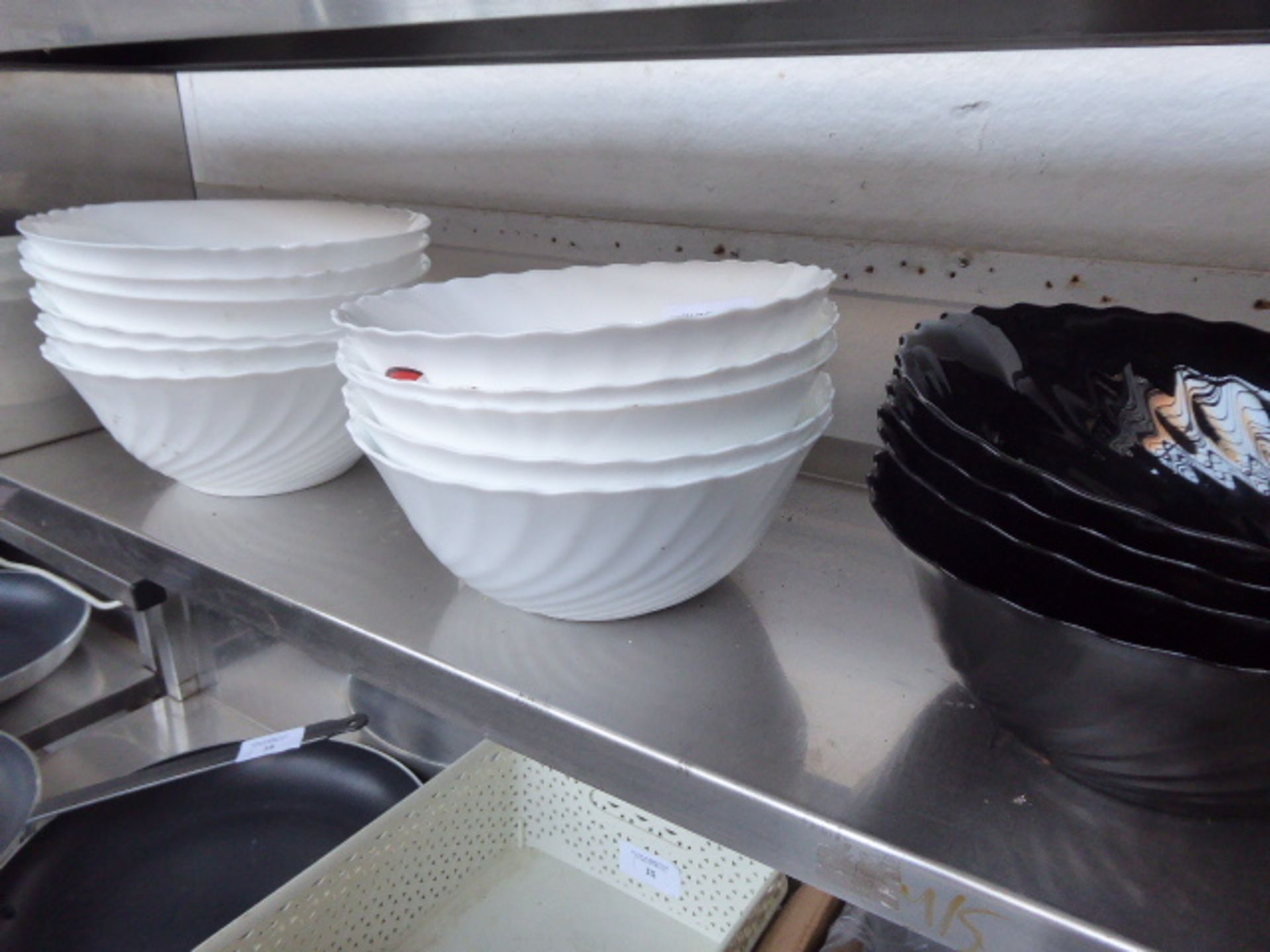 11 white and 4 black salad display bowls