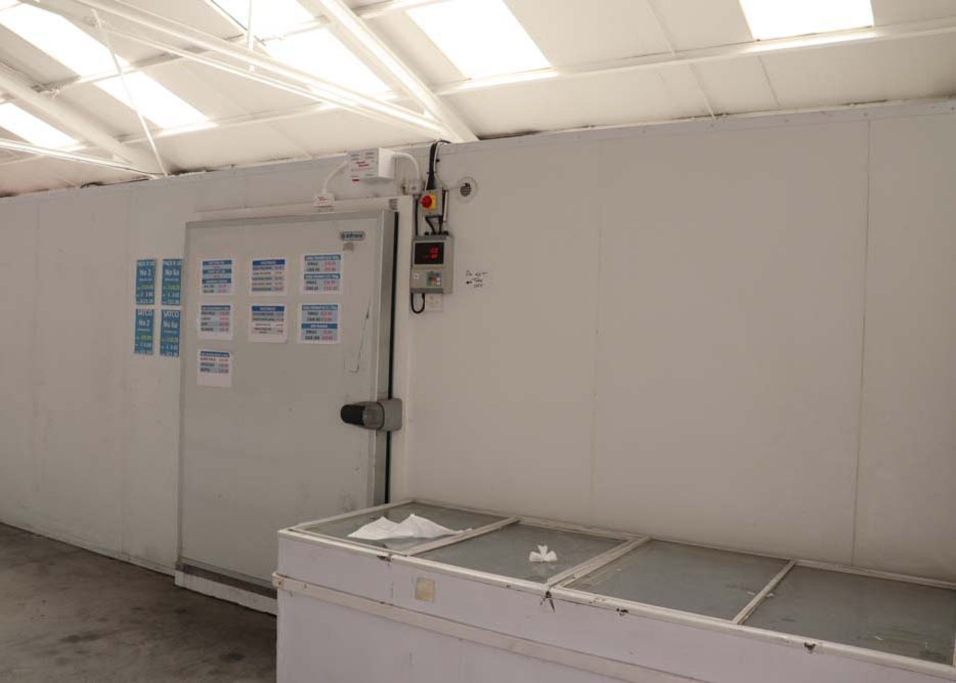 Freezer room - internal measurements approx 5 x 8.5 metres, external height 2.5m, single door,