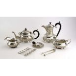 A cased Anglo-Indian thirteen piece silver tea service comprising teapot, coffee pot, milk jug,