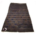 A Baluch Balouch kilim with rows of varying geometric designs,