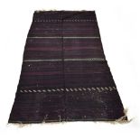 A Baluch Balouch kilim with rows of varying geometric designs,