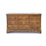 An 18th century oak and walnut crossbanded mule chest,