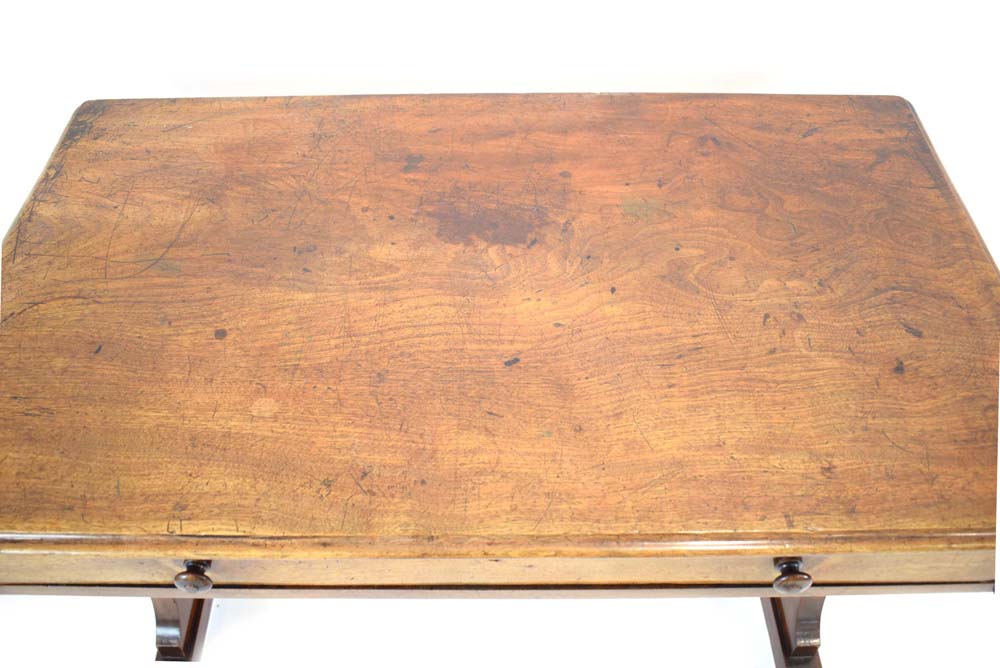 A mid-19th century mahogay writing table with a single frieze drawer on two panel supports, w. - Image 3 of 3