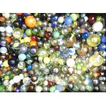 A collection of approximately three hundred and sixty Victorian and later glass marbles,