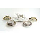 A mixed group of 19th century ceramics including a pair of tea bowls, a matching saucer,