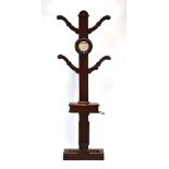 A late 19th/early 20th century mahogany hall stand with eight hooks,