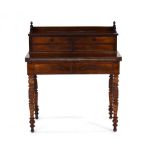A late 19th century mahogany games table with wave-decorated edges,