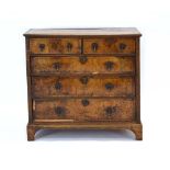 A George II and later walnut and crossbanded chest of two short over three long drawers,