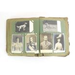 An album containing approximately four hundred and eighty postcards including greetings cards,
