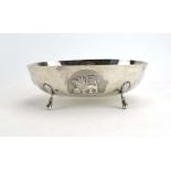 A (?)Cypriot metalware bowl of oval form repousse decorated with a double eagle,