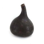 A Kenyan gourd carved with elephants and geometric motifs, h.