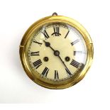 An early 20th century brass and tole bulkhead clock, the face with Arabic numerals, d.