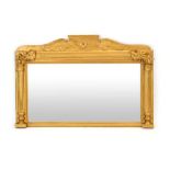 An 18th century style giltwood overmantle mirror with pilasters and foliate mouldings,