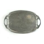 Hutton of Sheffield, an English Pewter tray relief decorated in the Art Nouveau manner,