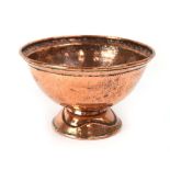 An Arts & Crafts hammered copper bowl on stand, h.