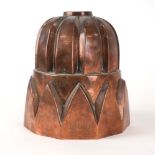 A 19th century copper jelly mould, inscribed E.B.H., h.