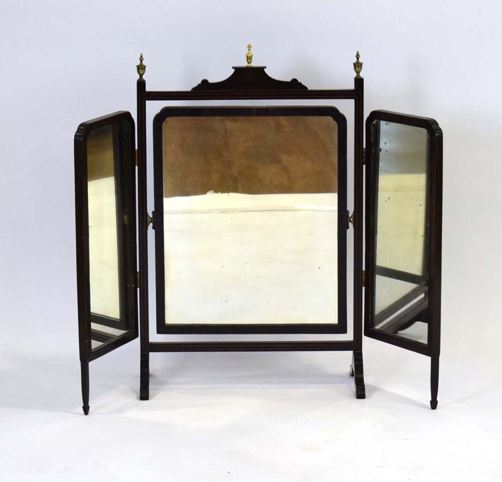 A late 19th/early 20th century ebonised and strung three-panel dressing table mirror with gilt