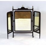 A late 19th/early 20th century ebonised and strung three-panel dressing table mirror with gilt