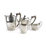 An early 20th century silver four piece tea service of canted vase shaped form, Mappin & Webb,