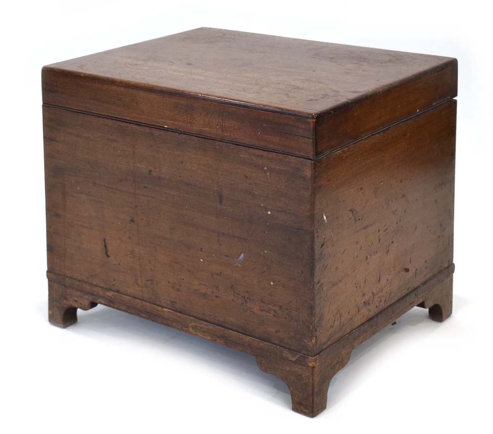 A 19th century mahogany box containing a removable lining, on bracket feet, w.