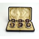 A cased set of six early 20th century silver and tortoiseshell menu holders decorated in the