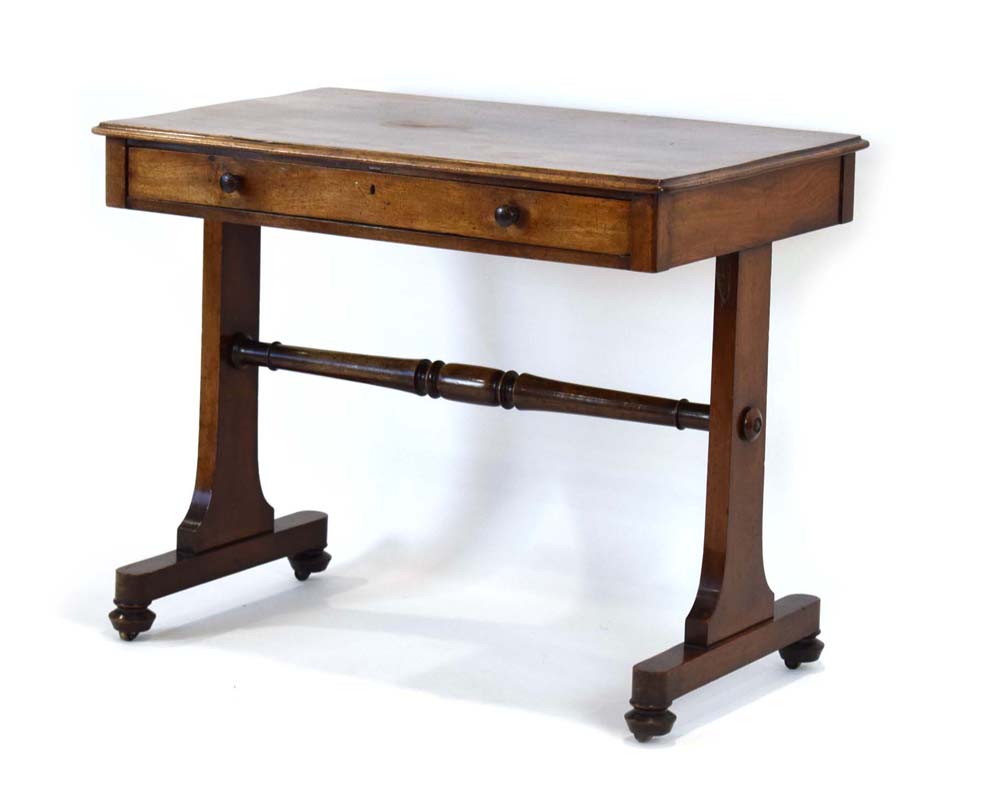 A mid-19th century mahogay writing table with a single frieze drawer on two panel supports, w. - Image 2 of 3