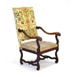 A late 19th/early 20th century beech and upholstered side chair with scrolled arms and feet,