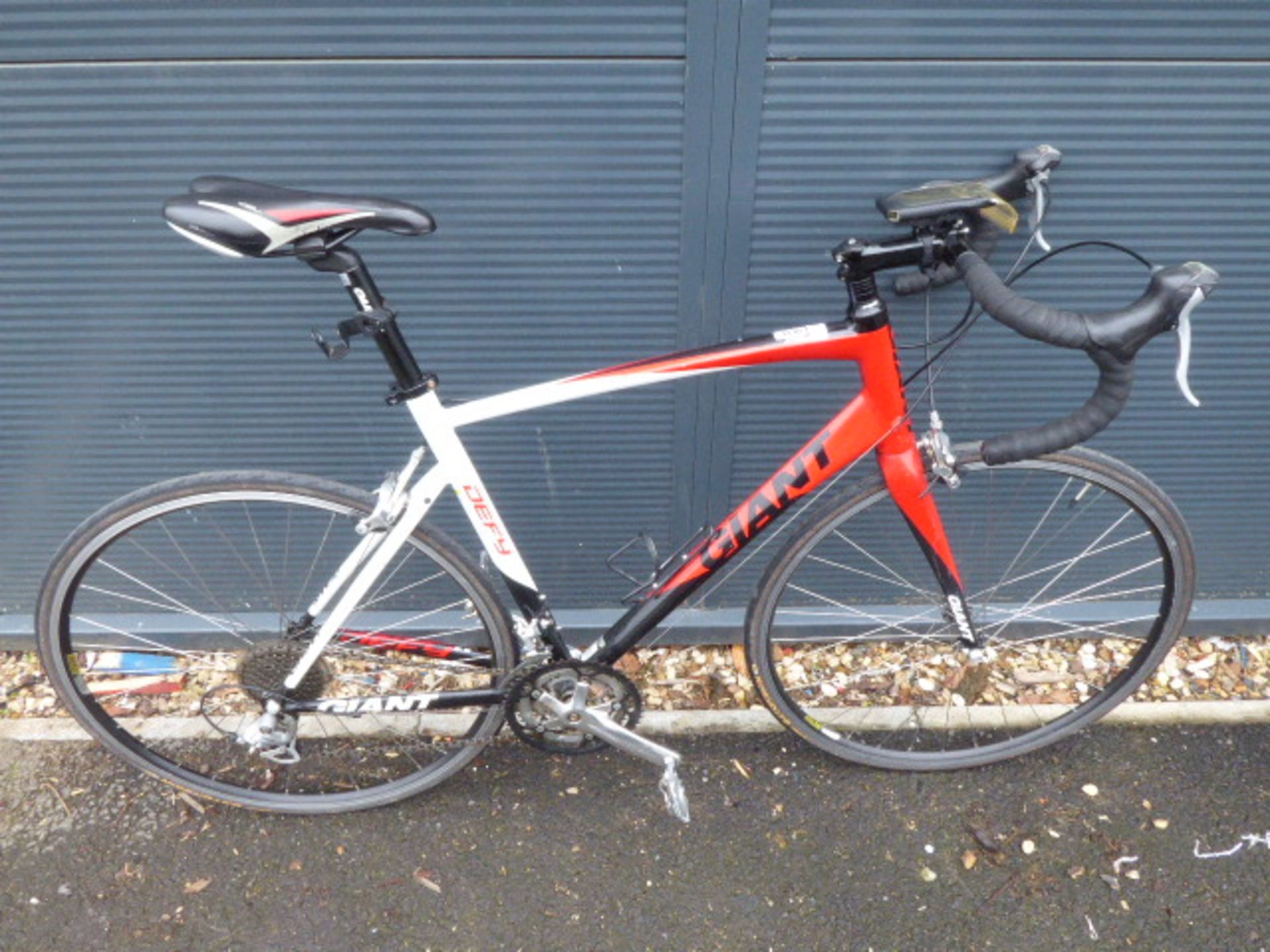 Red, black and white giant racing bike