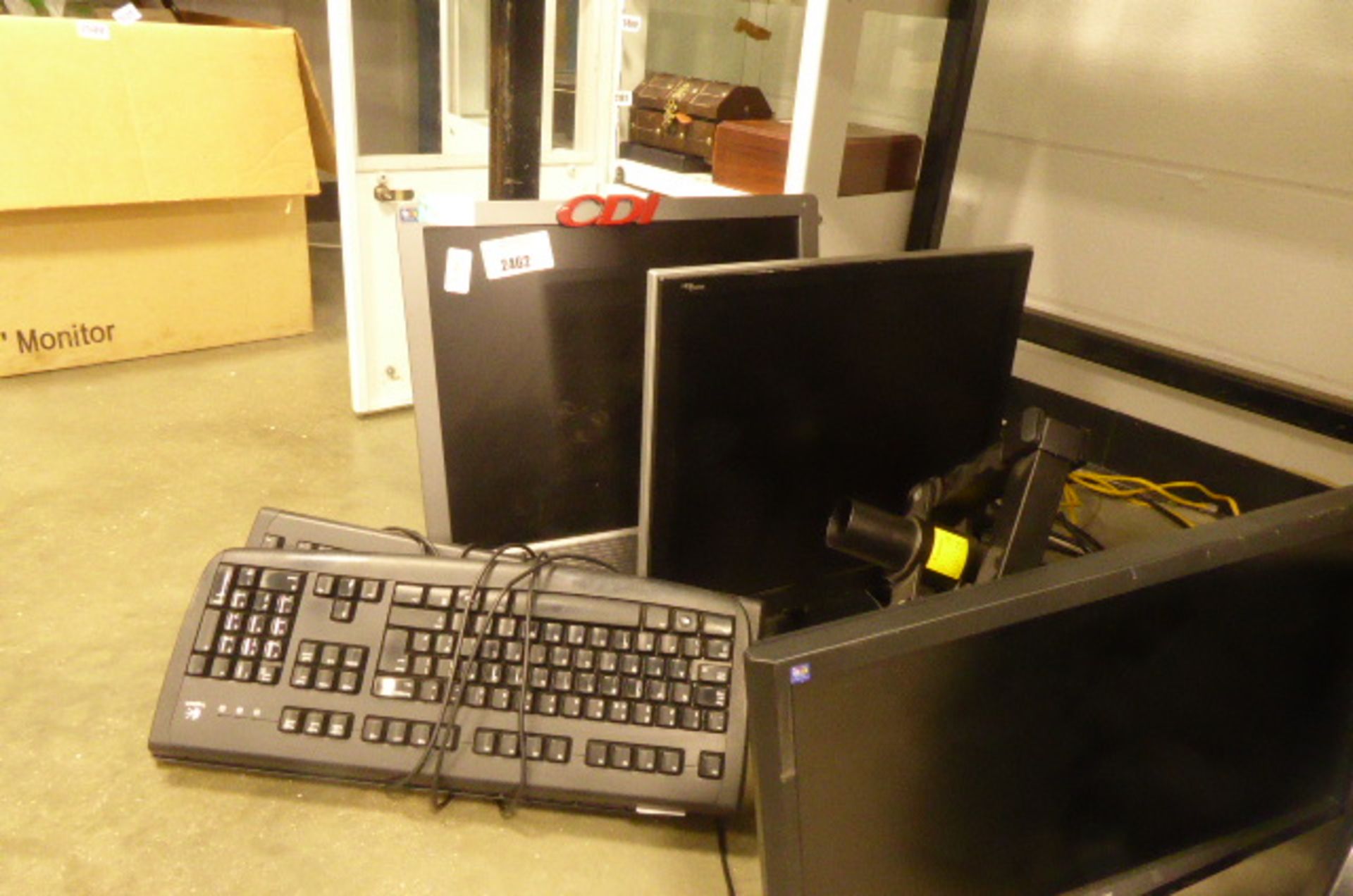 3 LCD PC monitors, Multi arm PC desk mount and 3 keyboards