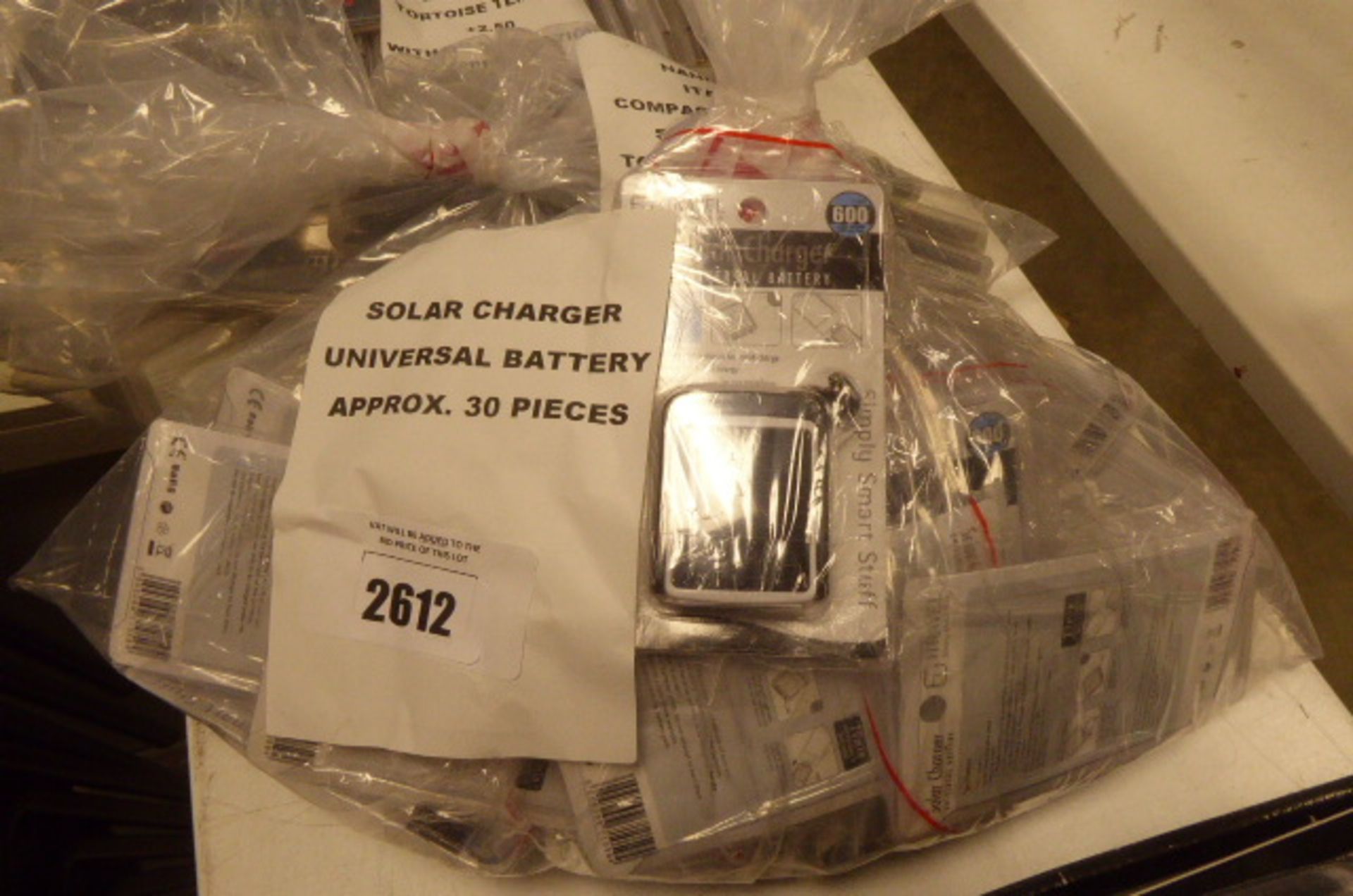 Solar charger and battery (approx 30 pieces in bag)