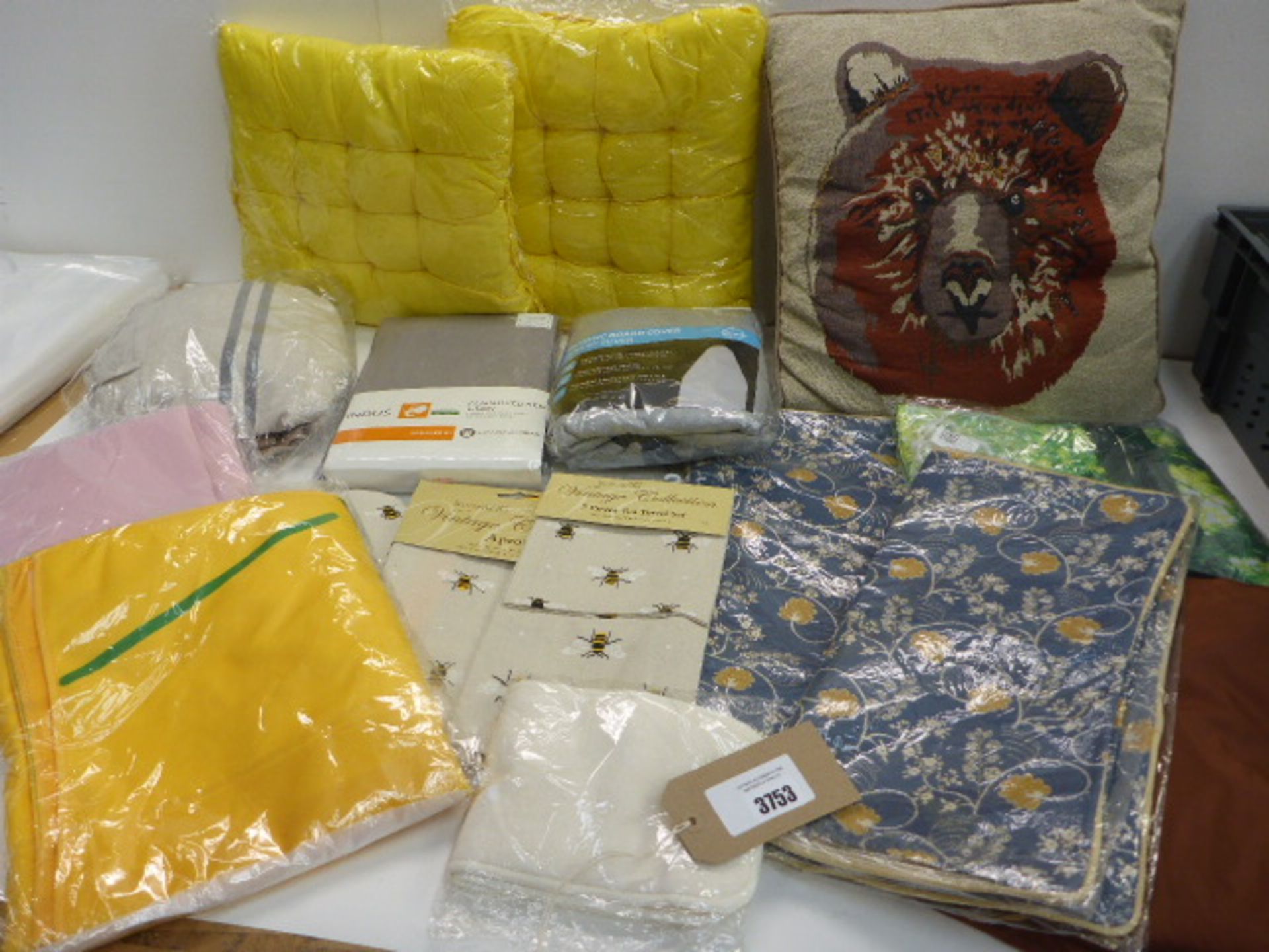 Cushions, bedding, cushion covers, tea towels, oven gloves, ironing board cover etc