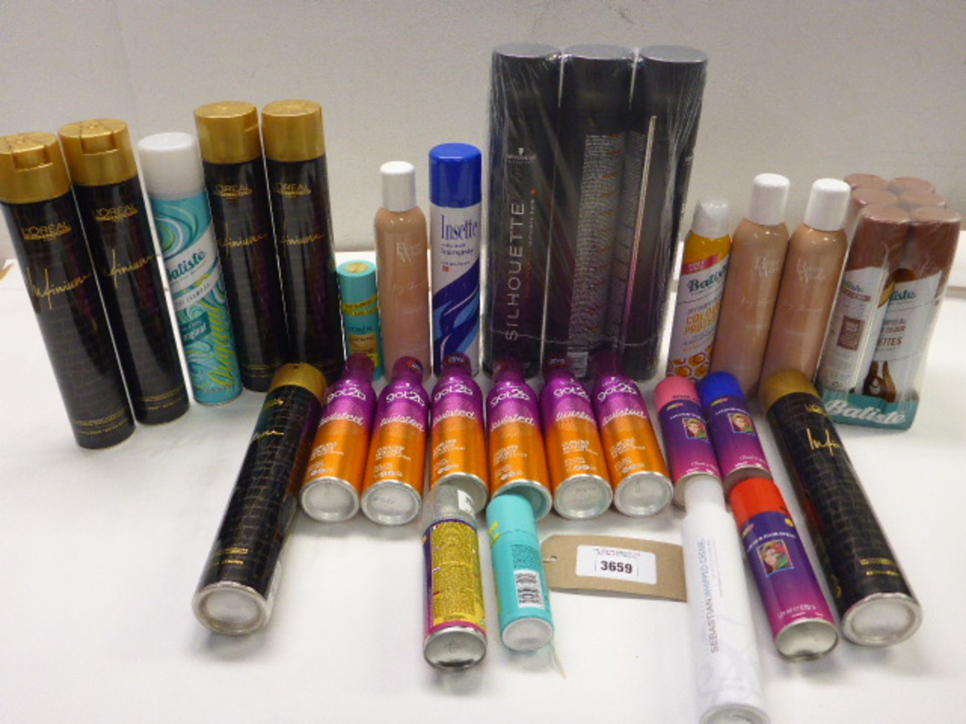 Selection of hair products including hair sprays, styling mousse, dry shampoo etc