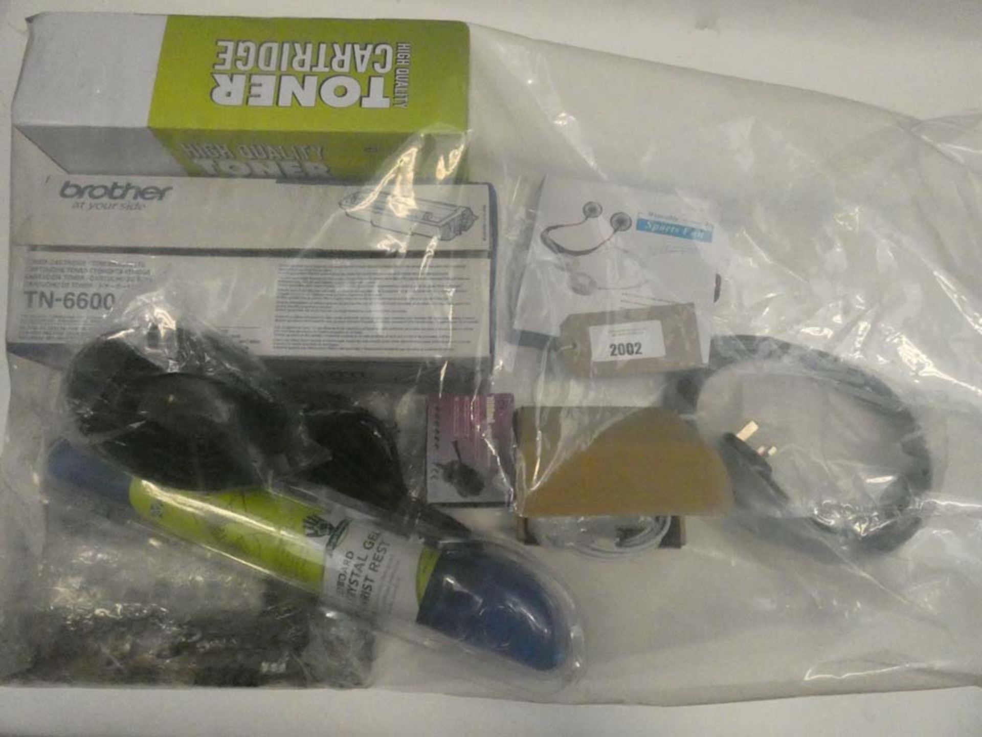 Bag containing toner cartridges and miscellaneous electrical related accessories