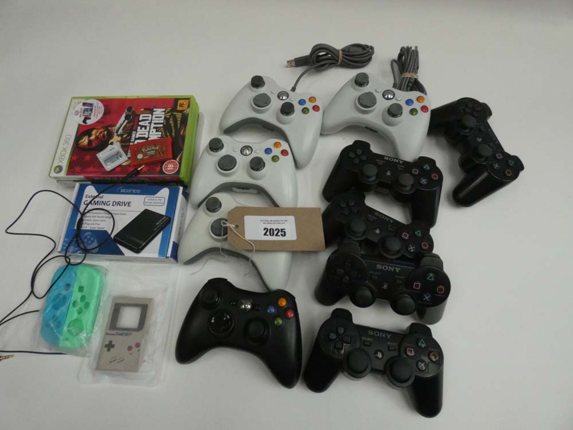 Bag containing quantity of various console controllers and games