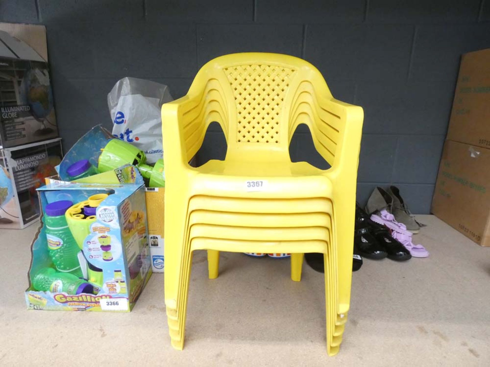 Quantity of children's yellow outdoor chairs