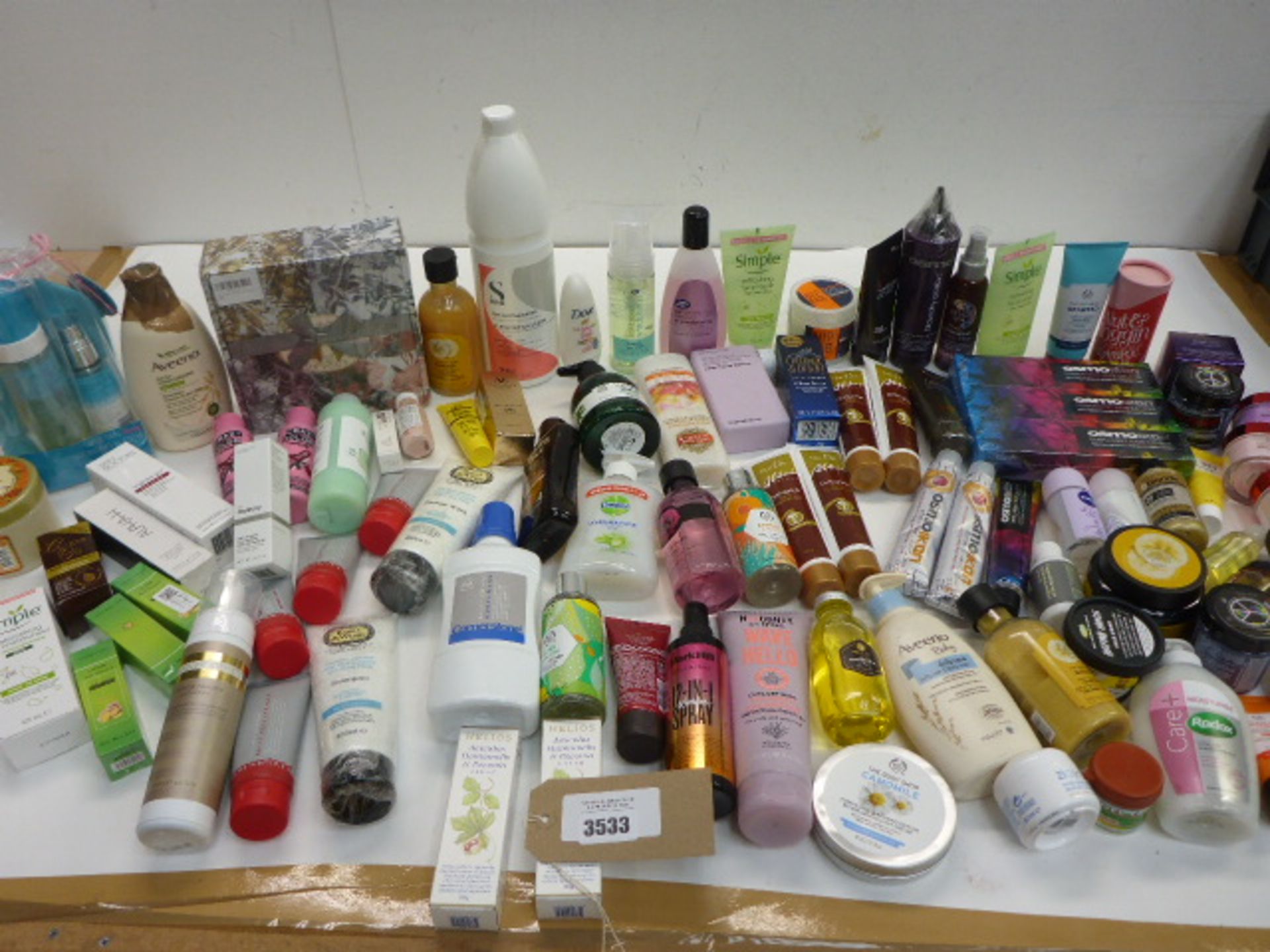 Large bag of toiletries including sun protection, masks, shampoo, conditioner, body wash,