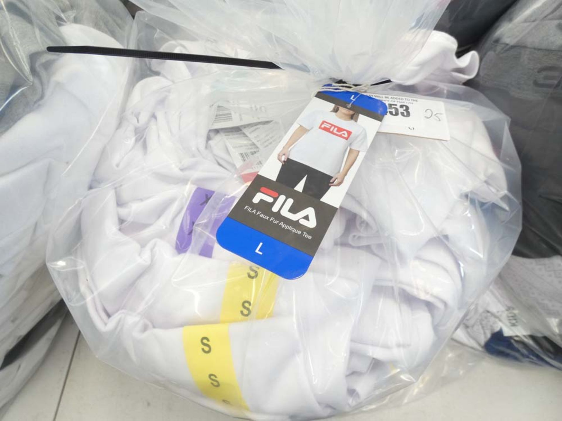 Bag containing approx 25 ladies Fila t shirts
